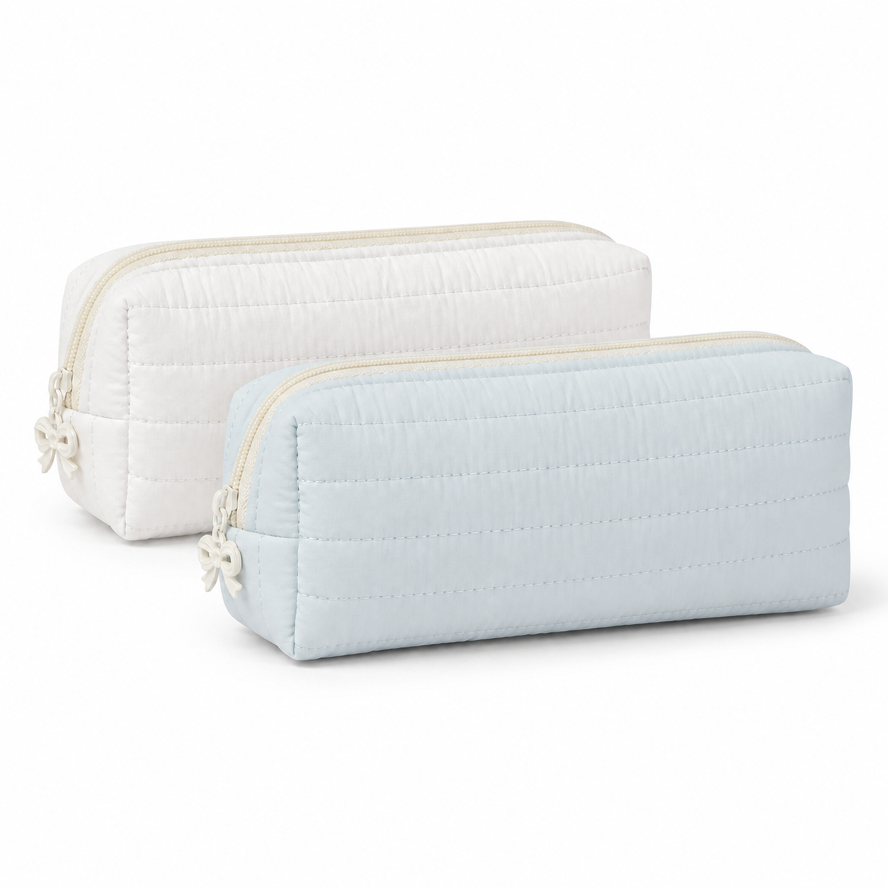 Soft Blue and white Cloud Puff quilted pencil cases with cream bow zipper charms on a white background