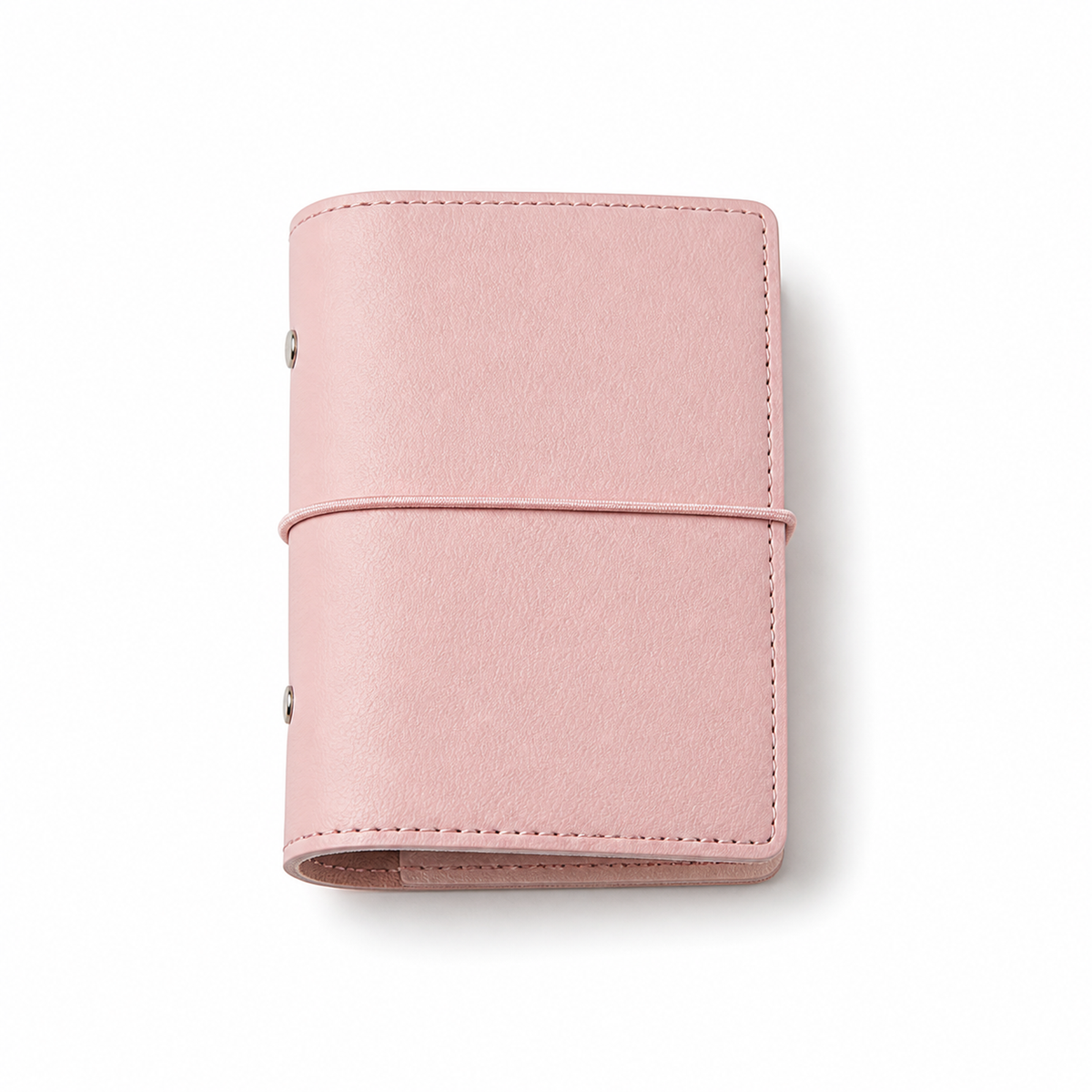 Baby Pink A7 Pocket six-ring planner cover with elastic closure on a white background