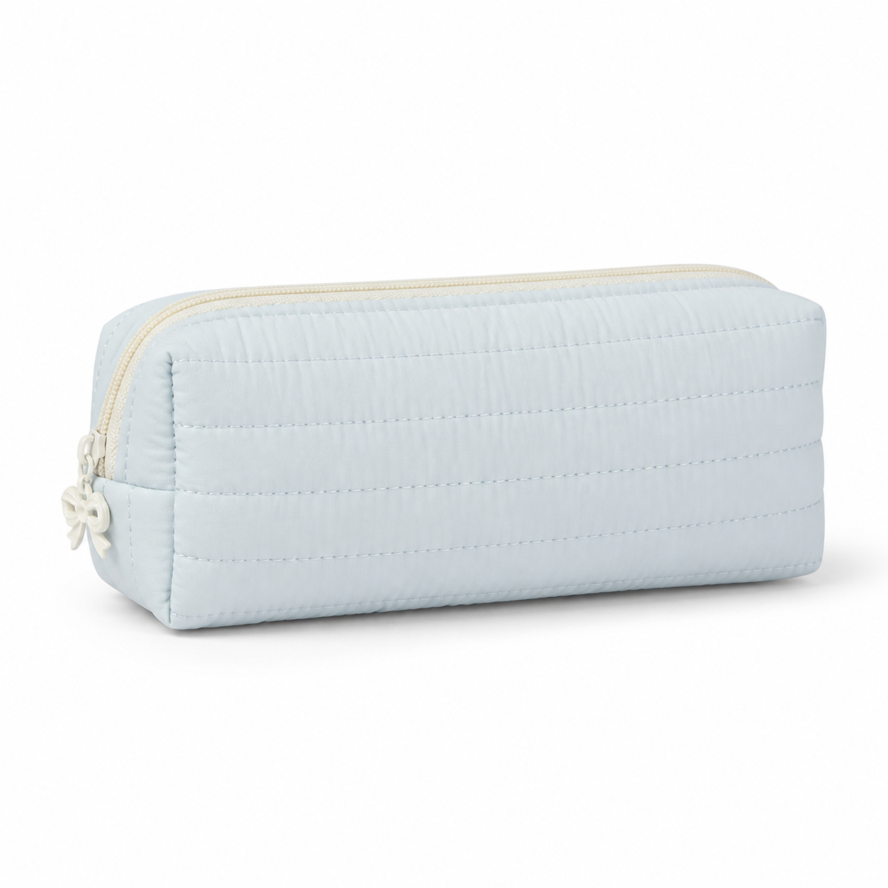 Soft Blue Cloud Puff quilted pencil case with cream bow zipper charm on a white background