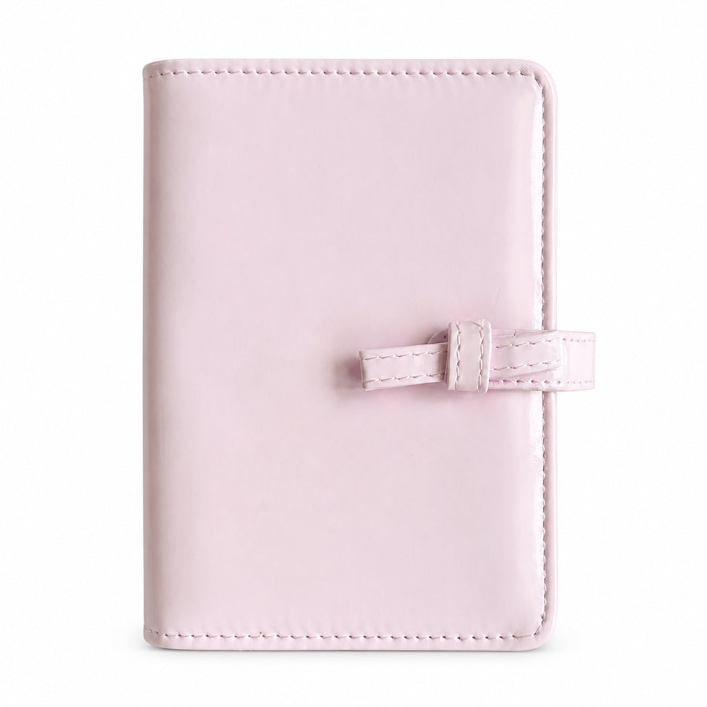 Blush pink bow A7 Pocket six-ring planner binder cover on a white background