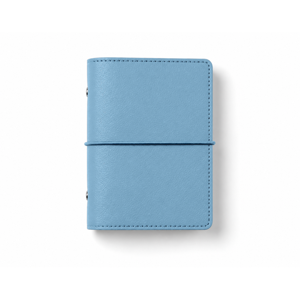 Sky Blue A7 Pocket six-ring planner cover with elastic closure on a white background