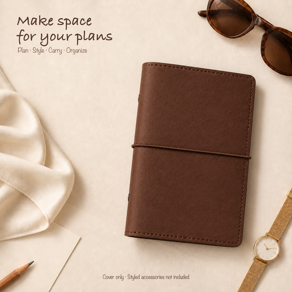 Brown A6 Personal planner binder styled on a warm ivory fashion flat lay