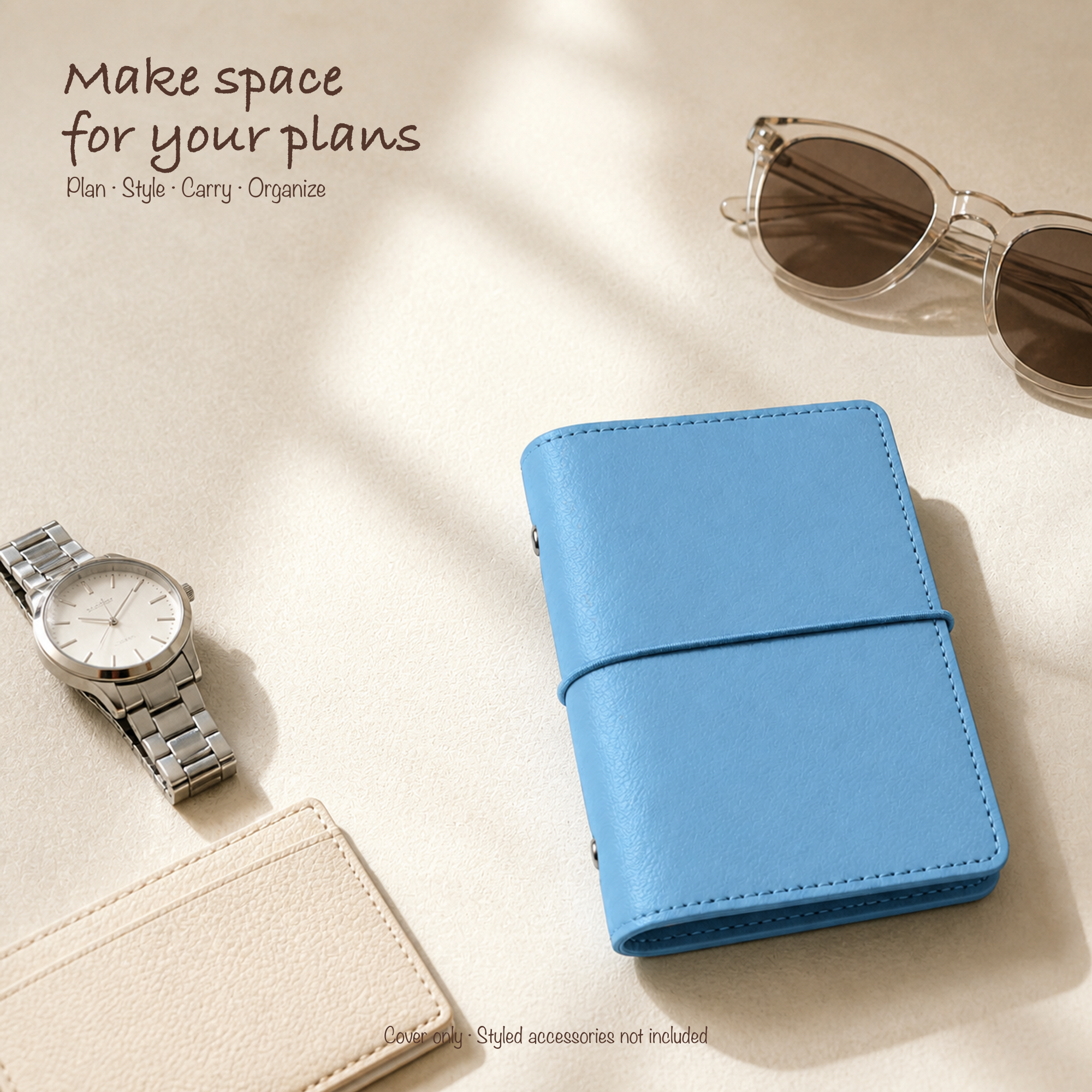 Sky Blue A7 Pocket planner cover styled with refined everyday accessories; cover only