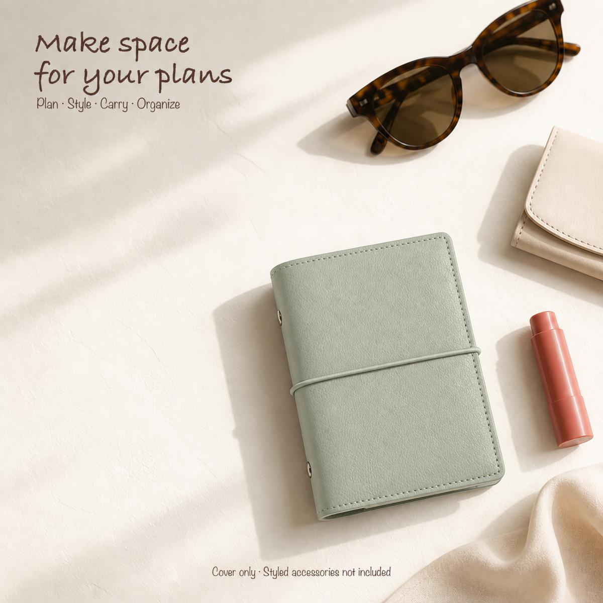 Soft Green A7 Pocket planner cover styled with refined everyday accessories; cover only