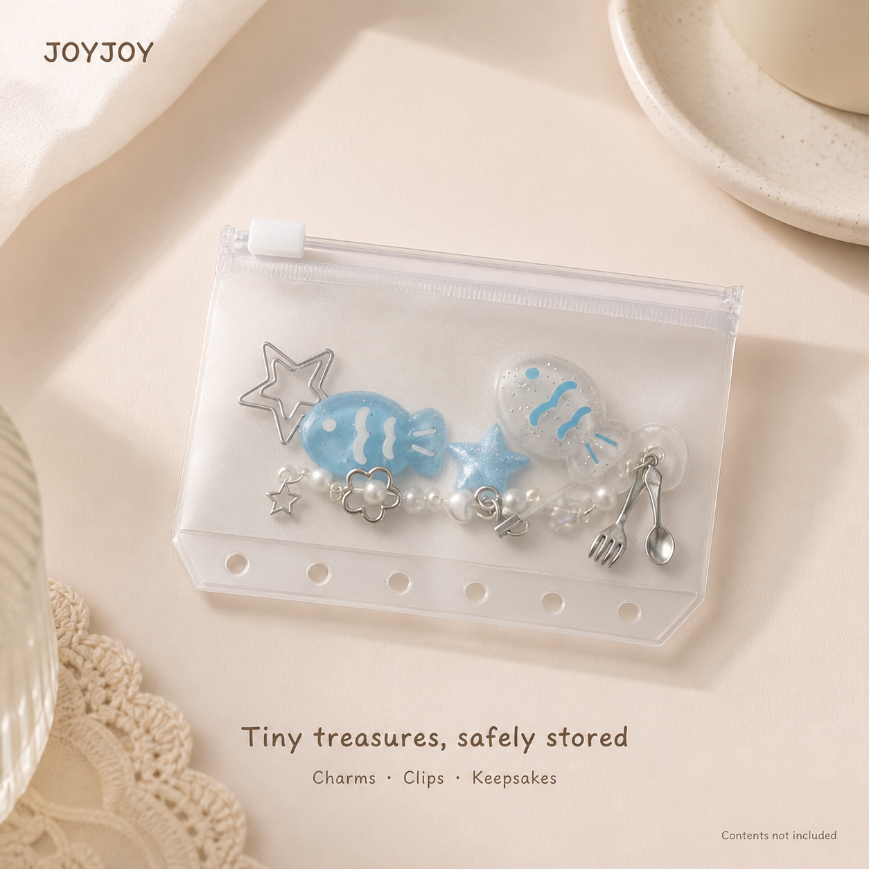 A7 zipper binder pocket holding small charms and keepsakes