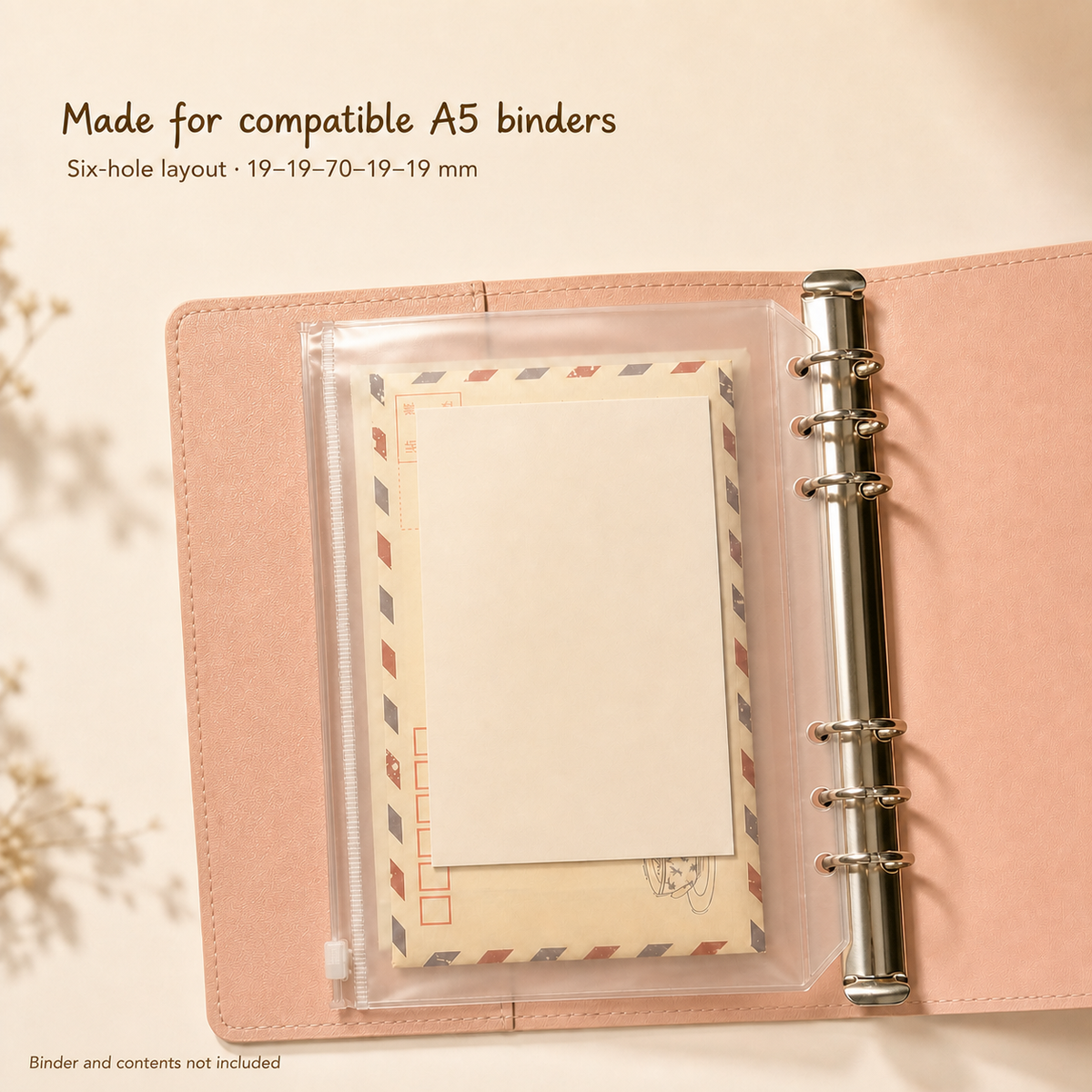 A5 zipper pocket fitted inside a compatible six-ring binder