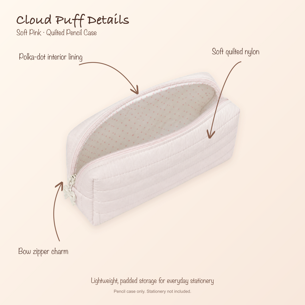 White Cloud Puff pencil case open to show soft pink polka-dot lining, quilted nylon, and bow zipper charm