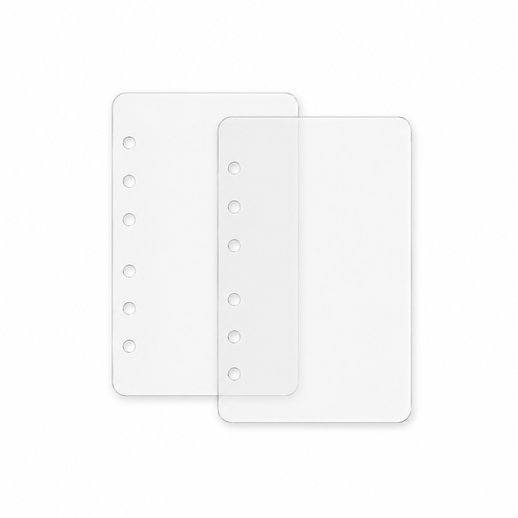 Two crystal-clear A7 PET planner dashboards with six holes on a white background