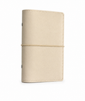 Beige A6 Personal six-ring planner cover with elastic closure on a white background