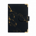 Black marble A6 budget binder cover with gold corner protectors on a white background