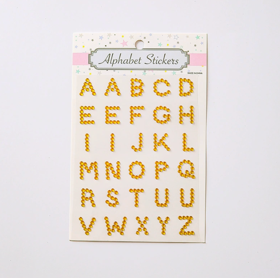 Gold rhinestone uppercase alphabet letter sticker sheet with 31 self-adhesive letters
