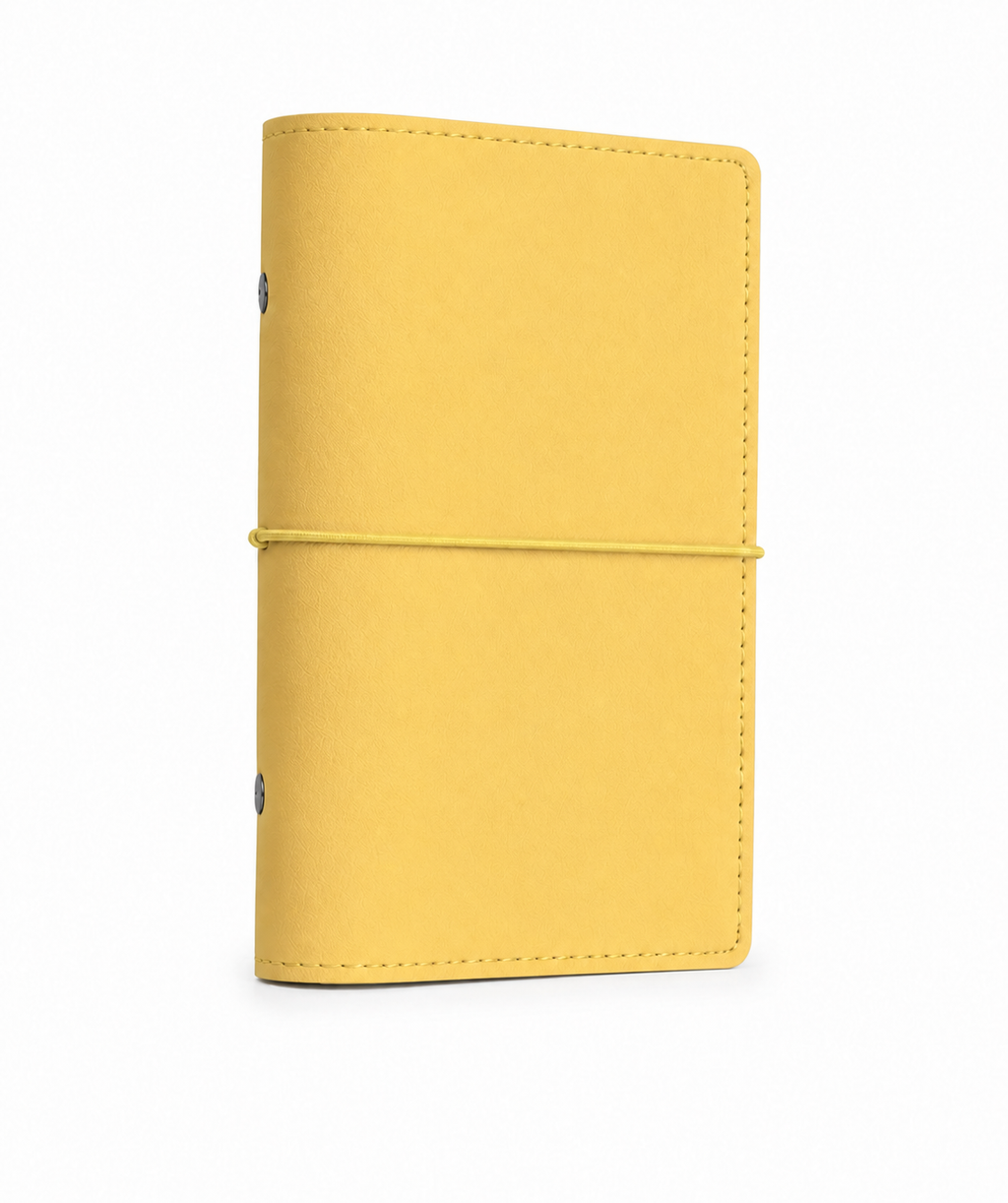 Butter Yellow A6 Personal six-ring planner cover with elastic closure on a white background