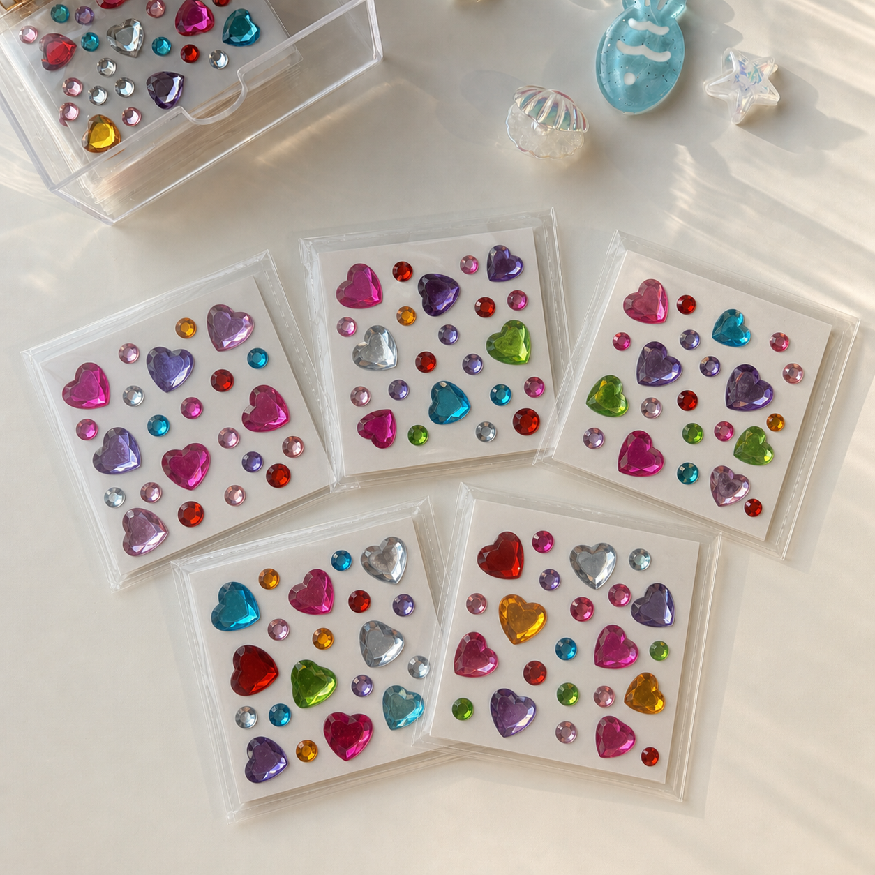 Five colorful self-adhesive heart mix — 27 gems sticker sheets; each sheet may have different colors and gem arrangements