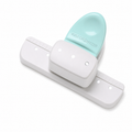 Mint green KW-triO 9027 small-hole planner punch on a white background