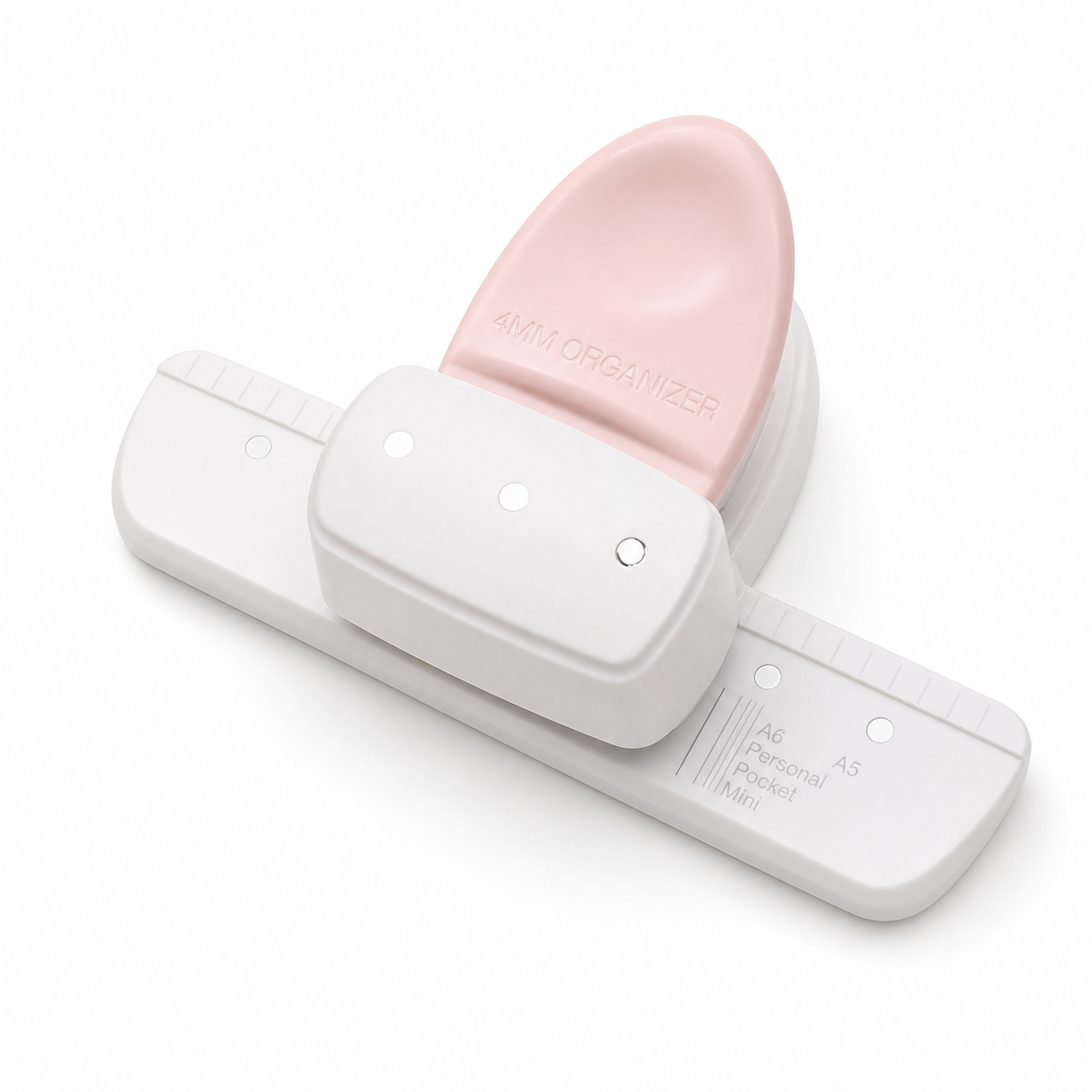 Soft pink KW-triO 9027 small-hole planner punch on a white background