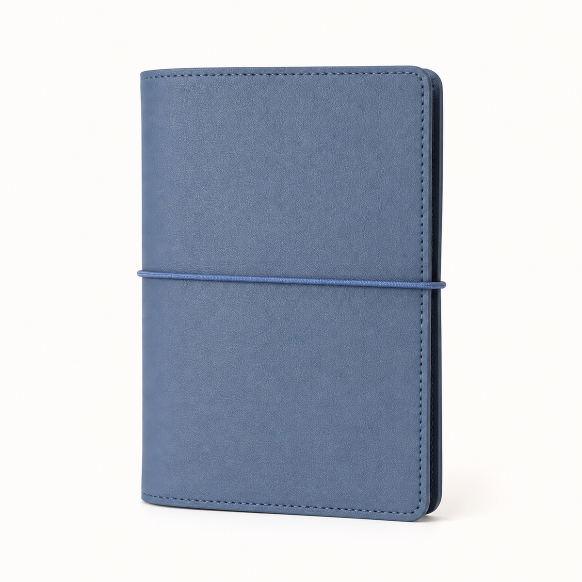 Light Blue A7 Pocket six-ring planner cover with elastic closure on a white background