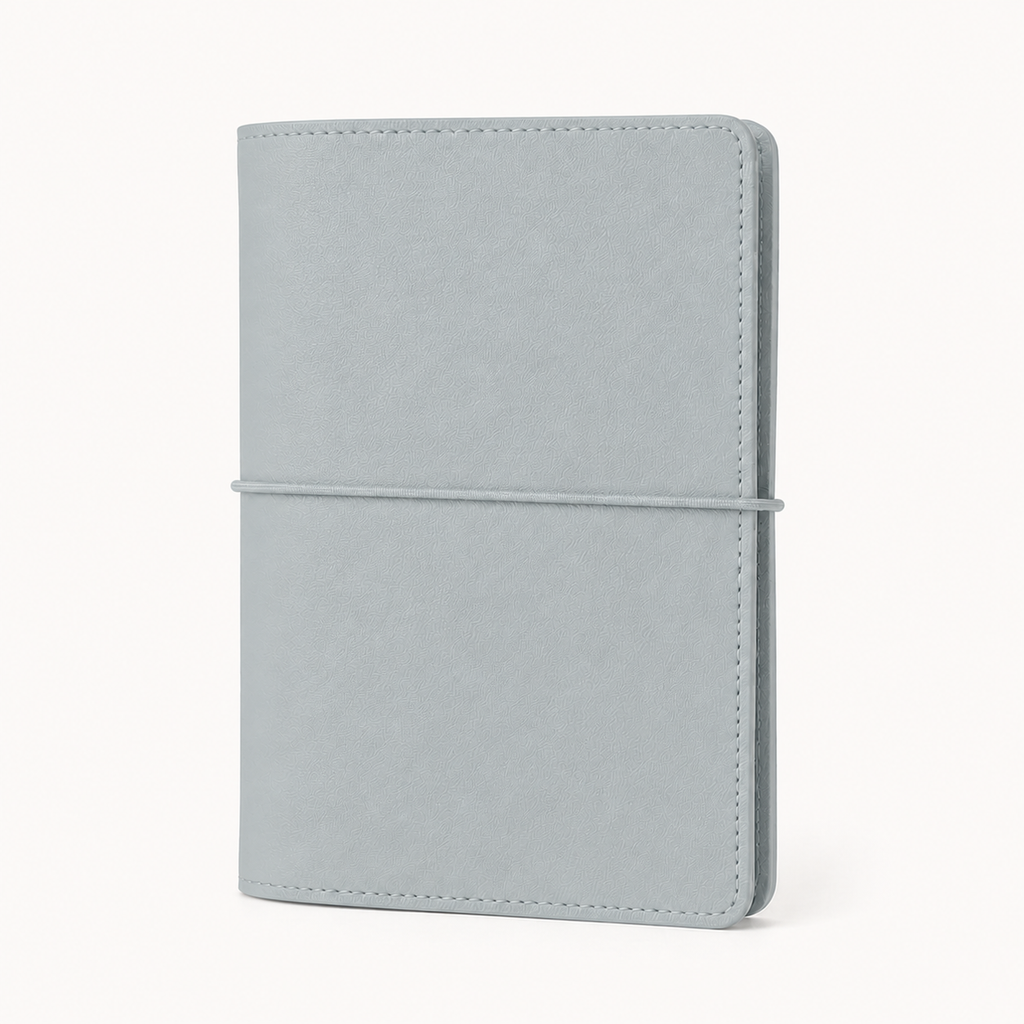 Light Blue A7 Soft Palette six-ring planner binder cover on a warm white background