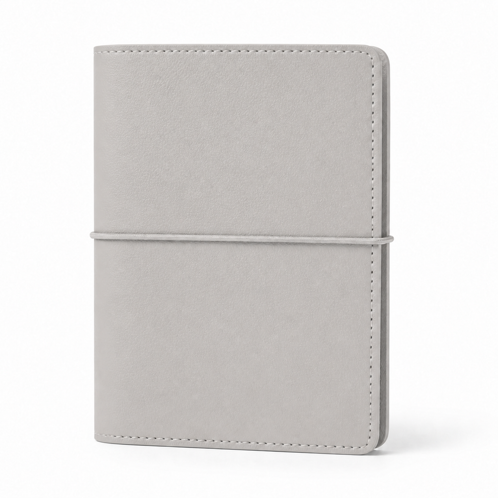 Light Gray A7 Pocket six-ring planner cover with elastic closure on a white background