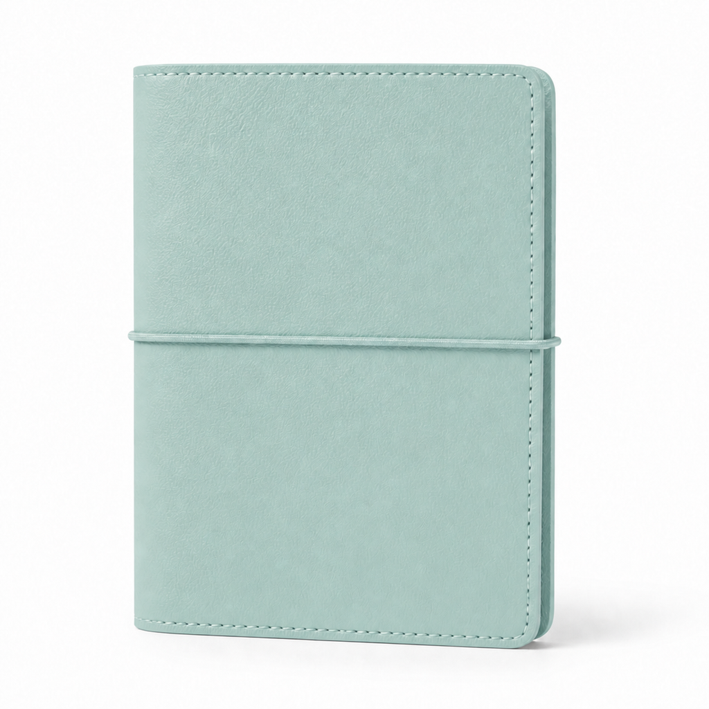 Light Teal A7 Pocket six-ring planner cover with elastic closure on a white background