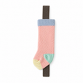 Pink sock-shaped planner pen holder with brown elastic notebook band on a white background