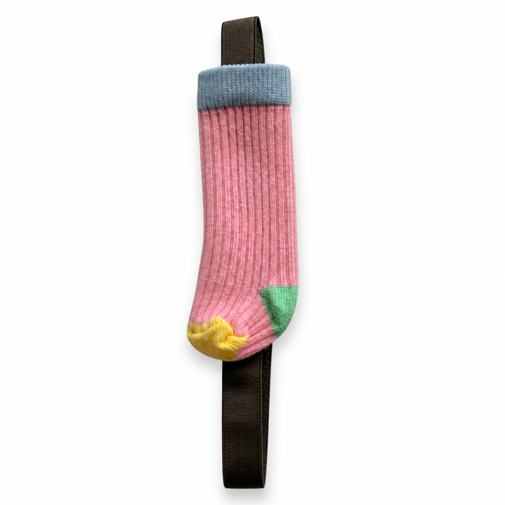 Real photo of pink sock planner pen holder and elastic band on a white background