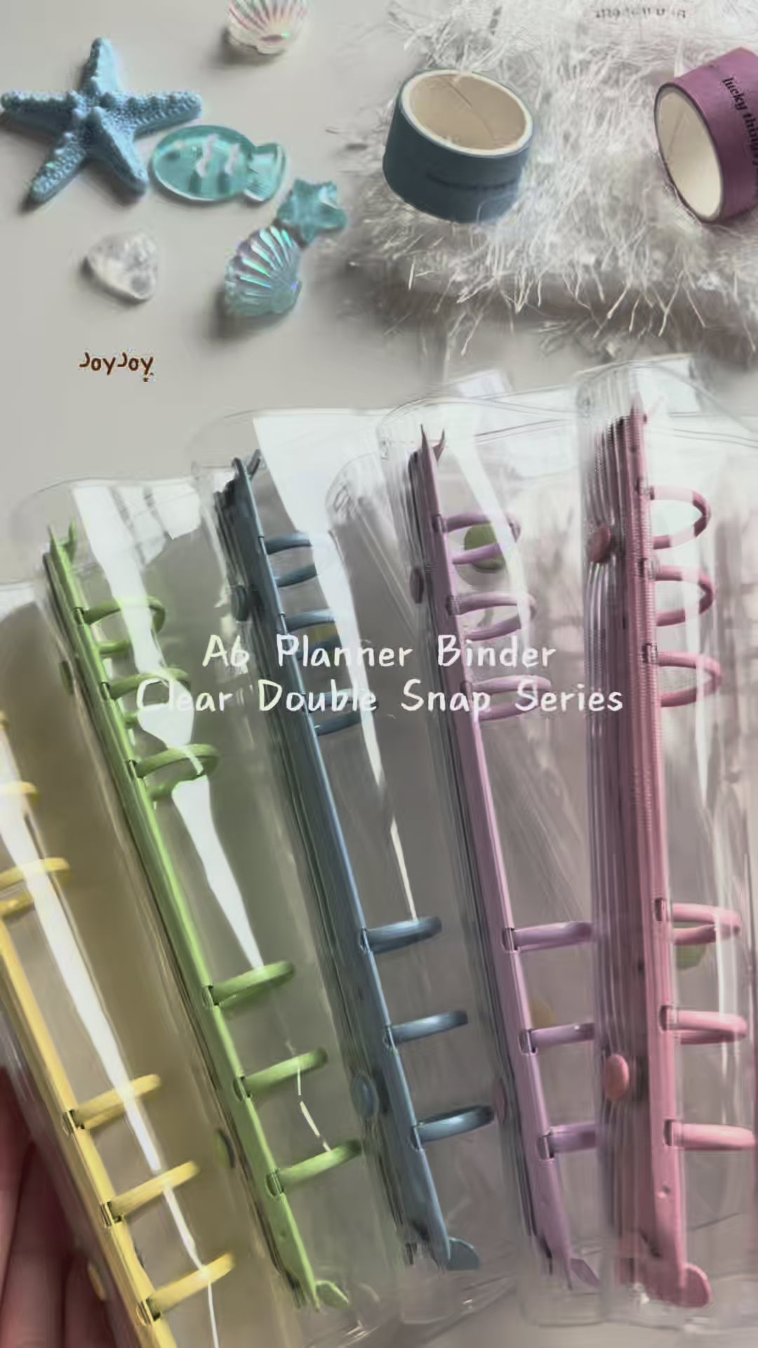 A6 Clear Double-Snap 6-Ring Planner Binder demonstration shown in Blue; color-specific product images show the Blue binder; cover only, inserts and accessories sold separately