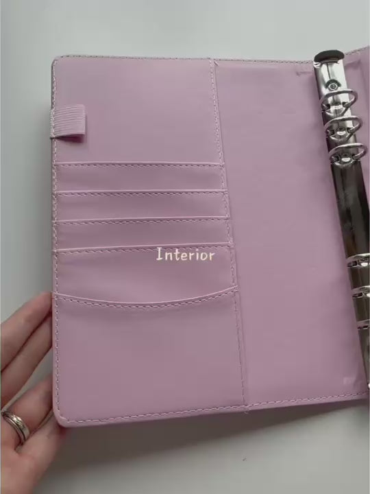 Baby Pink A5 Macaron planner binder feature demonstration; inserts and accessories shown are not included