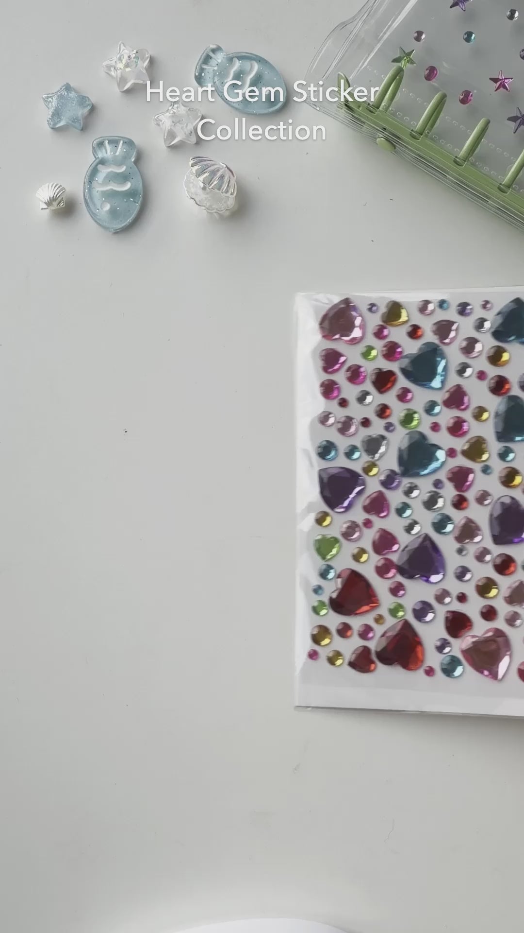 Five colorful Whimsy Gems heart sticker sheets in assorted gem sizes and color mixes; each 5-sheet pack varies