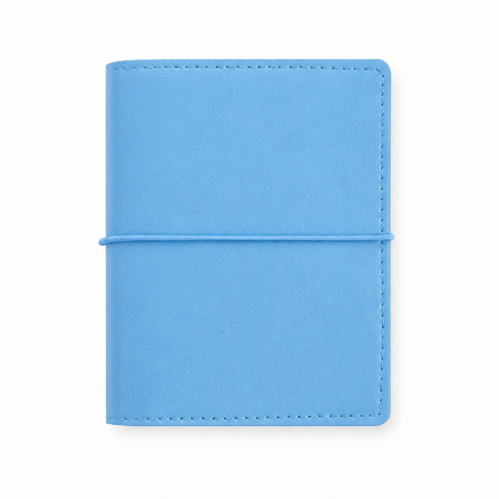 Sky Blue M5 Wide five-ring planner cover with elastic closure on a white background