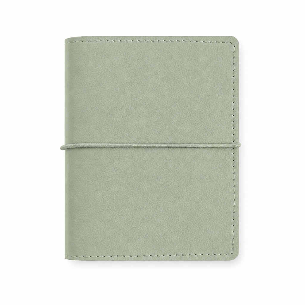 Soft Green M5 Wide five-ring planner cover with elastic closure on a white background