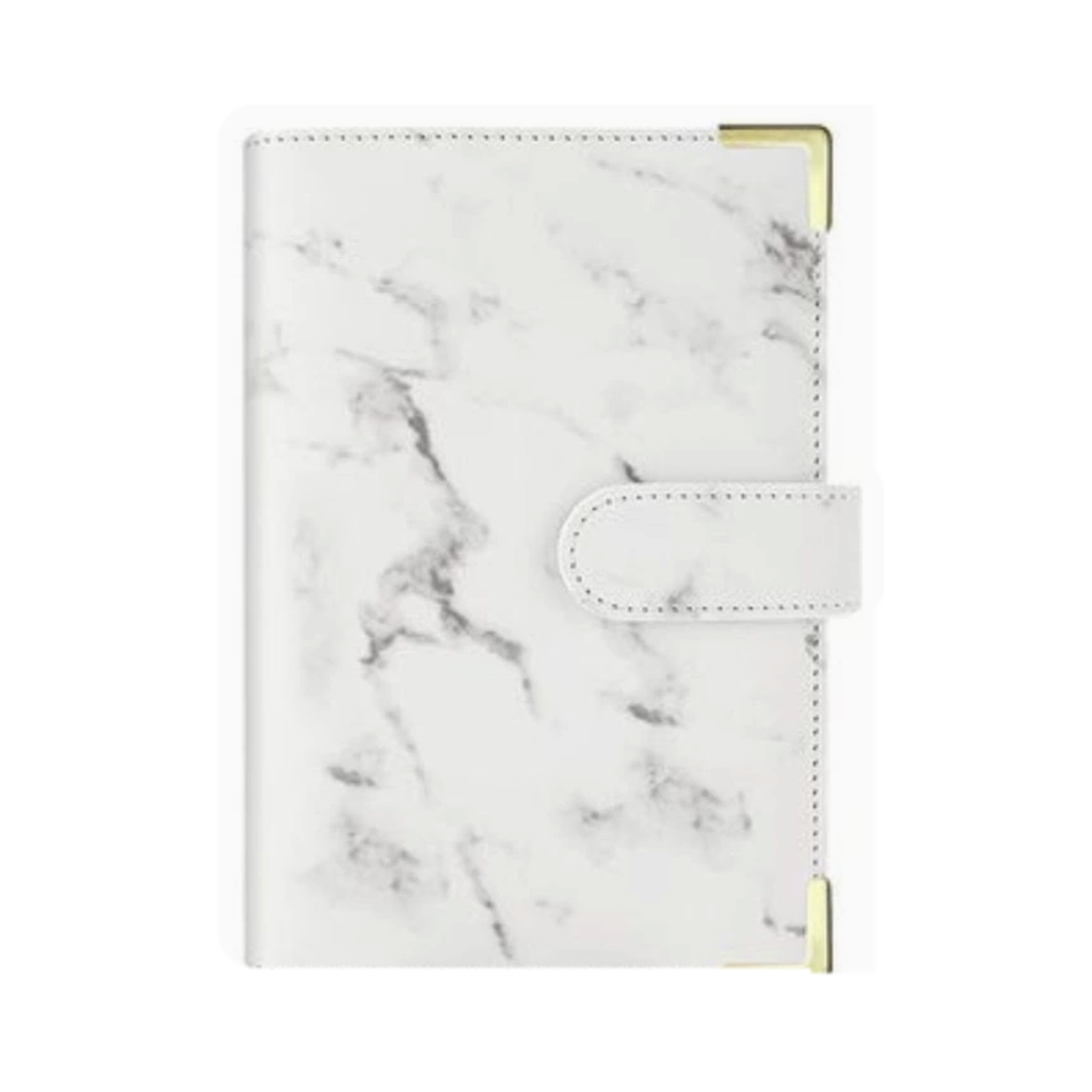 White marble A6 budget binder cover with gold corner protectors on a white background